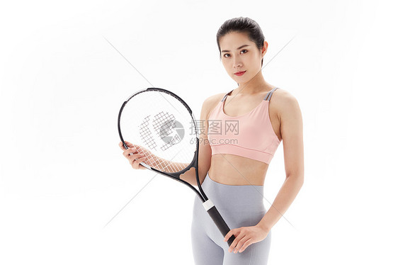 运动女性打网球 图片