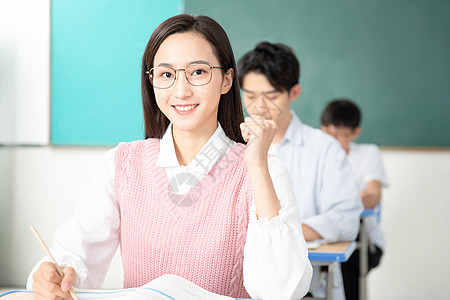 眼镜模特女女高中生学生加油打气背景