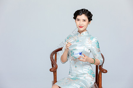 旗袍美女喝茶图片