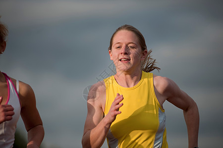 跑步比赛女运动员比赛背景