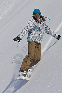 女滑雪运动员关闭滑雪道图片