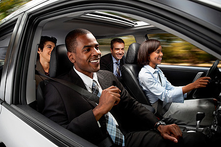 商人和妇女开车上班背景图片