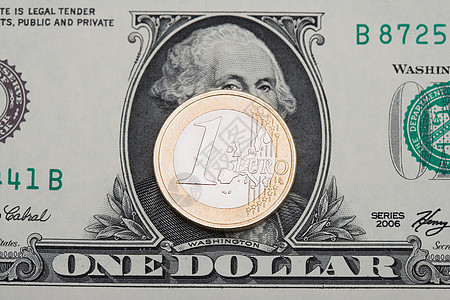美元钞票和欧元硬币图片