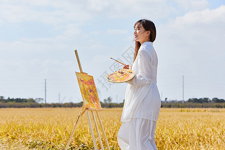 文艺清新美女户外油画写生图片