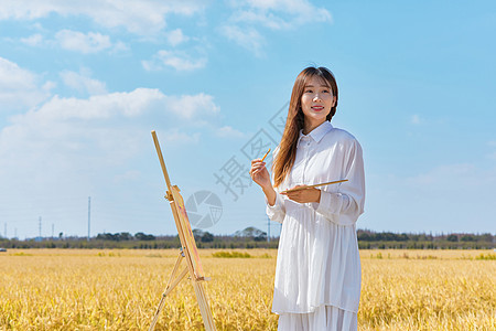 文艺清新美女户外油画写生图片