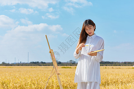 文艺清新美女户外油画写生图片