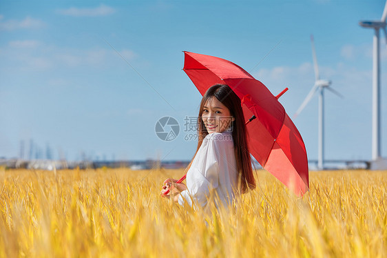 文艺美女手撑雨伞图片