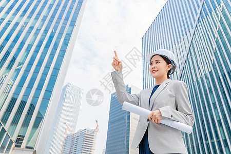 职业女性女性建筑工程师拿图纸背景