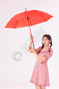 可爱女生手拿红伞图片