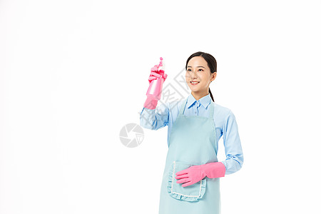 家政服务女性使用洒水器图片
