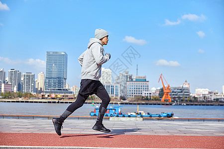 冬季跑步小常识男青年冬季户外跑步背景