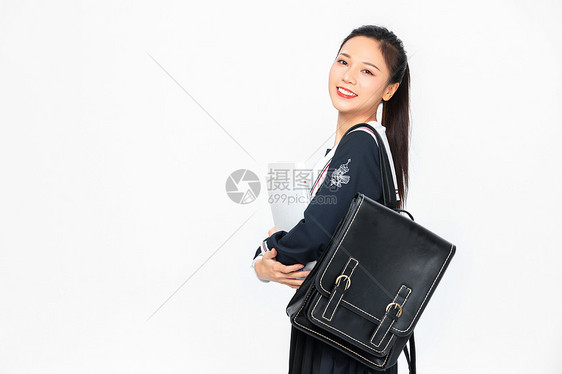 学院风大学生JK服美女抱书本图片