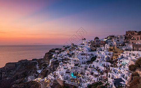 小镇夜景希腊海岛圣托里尼日落景观小镇伊亚背景