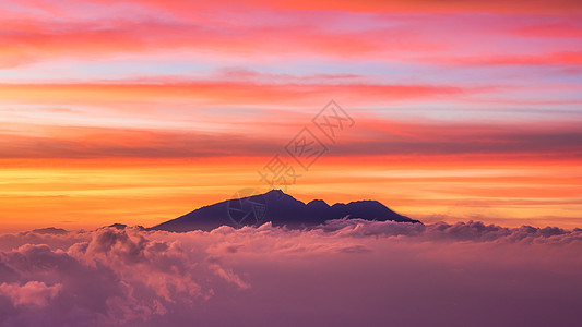 窗口夜景印尼火山云海火烧云背景