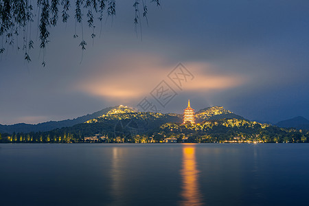 佛塔倒影杭州西湖雷峰塔夜景灯光背景