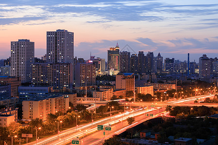 城市日落新疆乌鲁木齐市红山公园俯视图背景