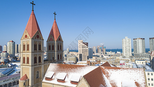 青岛天主教堂雪景背景图片