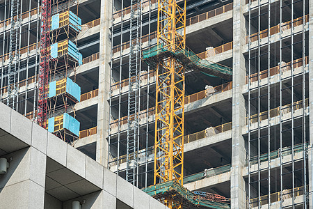 老旧小区改造高层建筑施工特写背景