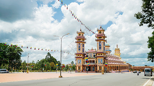 越南女越南西宁高台教圣地建筑及标志背景