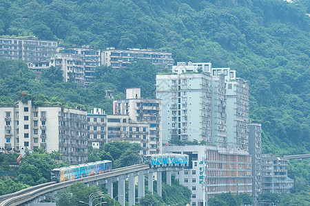 重庆网红旅游地标穿过楼宇的李子坝地铁站图片素材