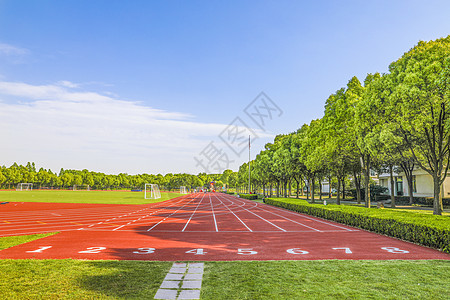 校园风光学校运动场和田径跑道背景