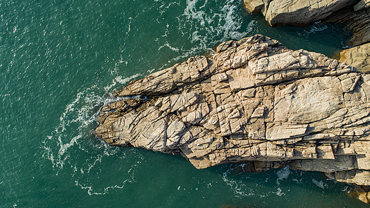 海水与礁石礁石与大海背景