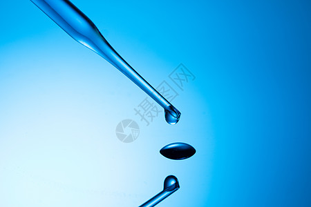 科技气泡化学实验滴管滴下液体水滴背景