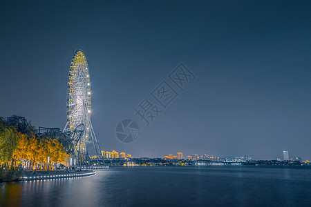 夜晚湖边苏州金鸡湖摩天轮夜景背景