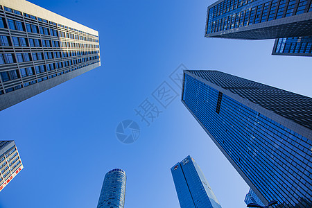 仰拍高楼青岛CBD中央商务区城市高楼大气商务办公背景