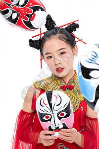 京剧摄影中国风潮流儿童拿着京剧面具背景