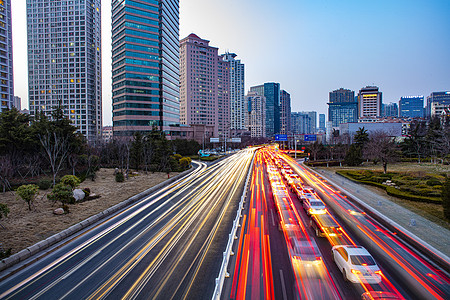 道路建设青岛城市主干道汽车光轨延时背景