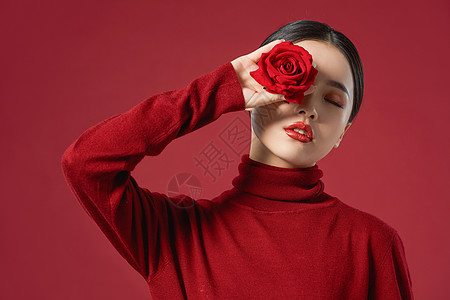 手绘玫瑰花时尚美女手拿玫瑰花背景