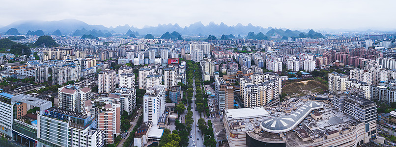 俯瞰山航拍桂林拼接图城市楼宇楼房建筑群山脉背景