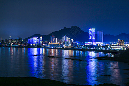 青岛海水浴场青岛崂山石老人海水浴场灯光秀背景