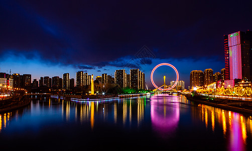 天津眼天津三岔口摩天轮夜景背景