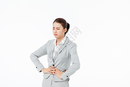青年商务女性腹部疼痛图片