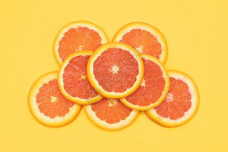 创意血橙水果切片组合背景图片