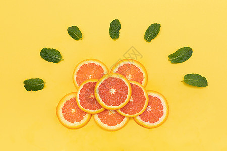 创意血橙水果切片组合背景图片