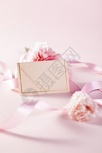 蝴蝶结和鲜花母亲节康乃馨卡片背景