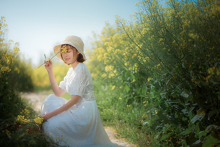 油菜花春景人像图片