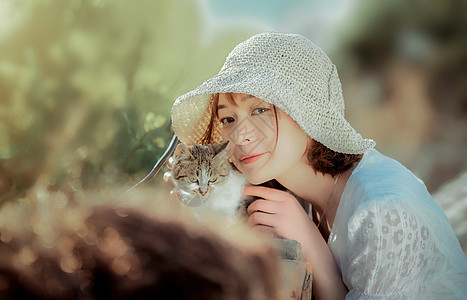 春游美女与猫咪背景图片