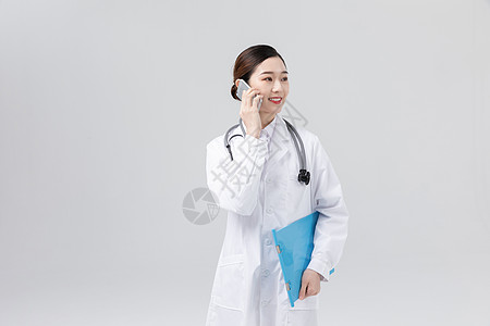 护士打电话打电话的女医生形象背景