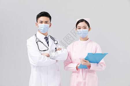 佩戴口罩与护目镜的医生与护士背景图片