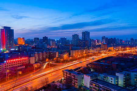 车流新疆乌鲁木齐夜晚城市车轨慢门风光摄影背景