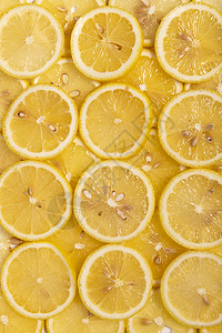 新鲜柠檬切片背景图片