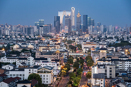 都市马路华灯初上的苏州古城区背景