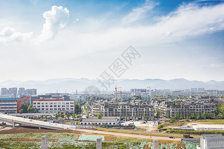 大楼远景城市美景中的蓝天白云背景