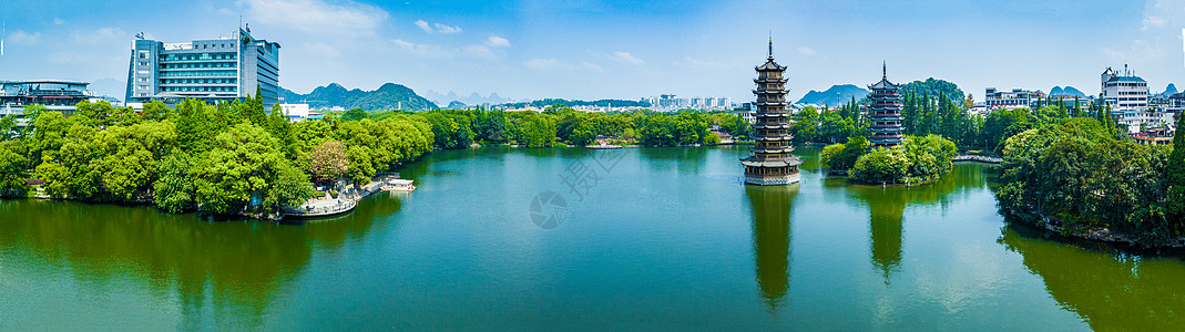 日月交替全景图拍摄桂林景区日月双塔背景