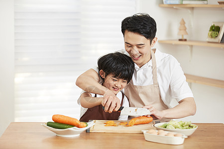 爸爸和儿子父亲教孩子切菜背景