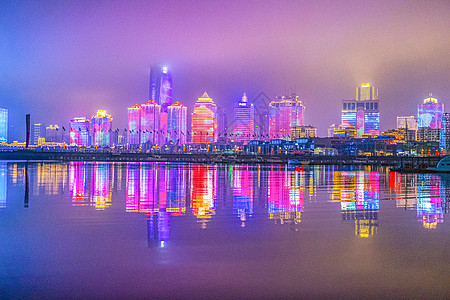 夜景亮化青岛海边城市灯光秀背景